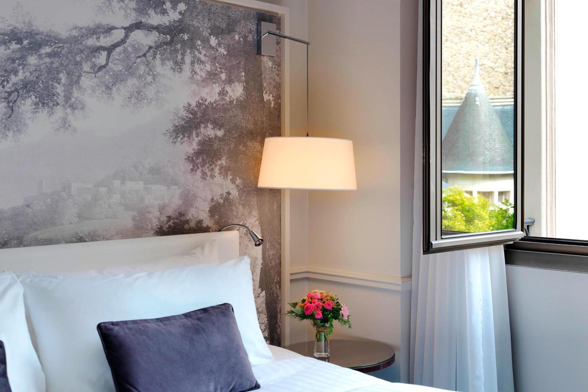 Deluxe Zimmer mit Queensize-Bett und Gartenblick
